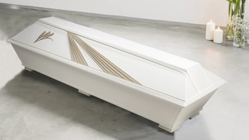 Vilja arkku Vaalealla pellavalla verhoiltu kotimainen arkku, jonka kannessa erottuu puinen viljakuvio – viittaus elokuun satoon ja elämän kiertokulkuun.