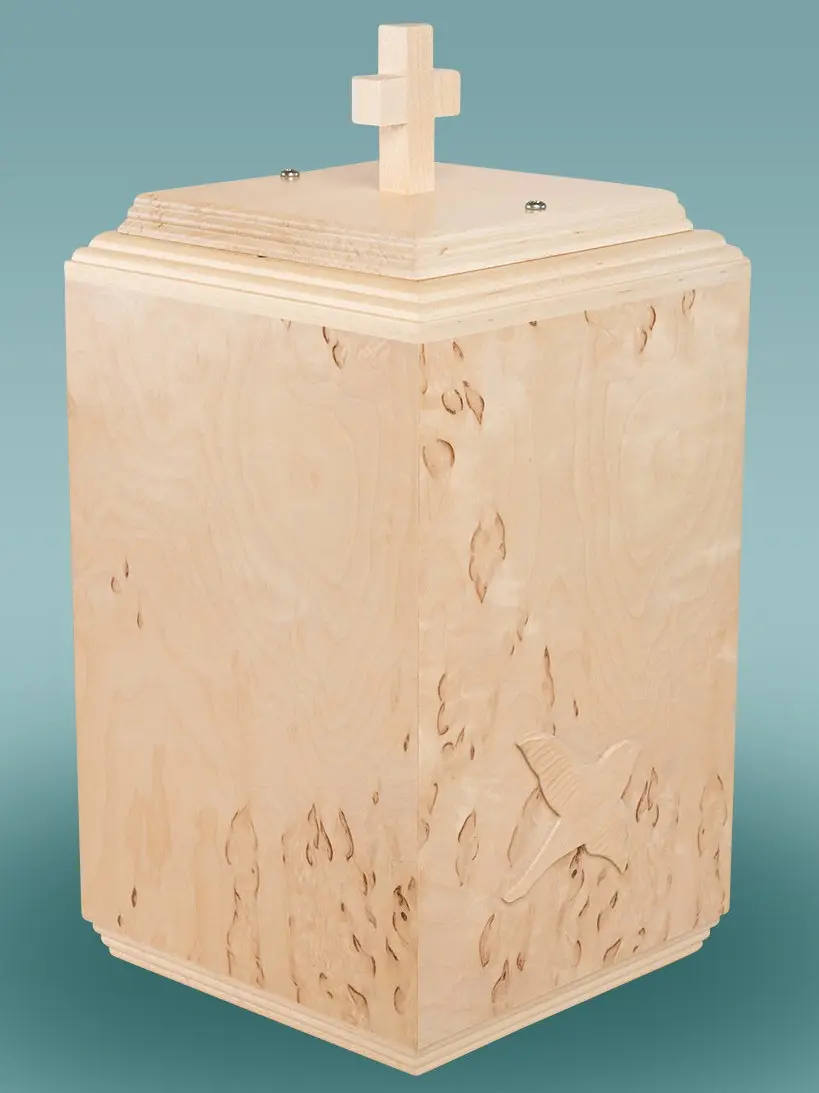 Visakoivu lintu uurna Käsityönä Punkalaitumella valmistettu uurna suomalaisesta visakoivusta. Uurnan arvokasta pintaa koristaa taivaalle kohoava lintu.